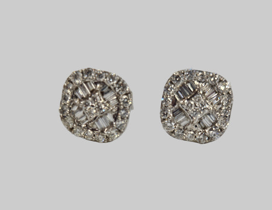 Pair of silver earrings with gemstones on a light gray background