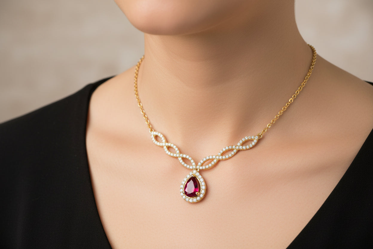 14K YELLOW GOLD DIAMOND .25 CTW, PEAR SHAPE RUBY 0.45 CTW PENDANT