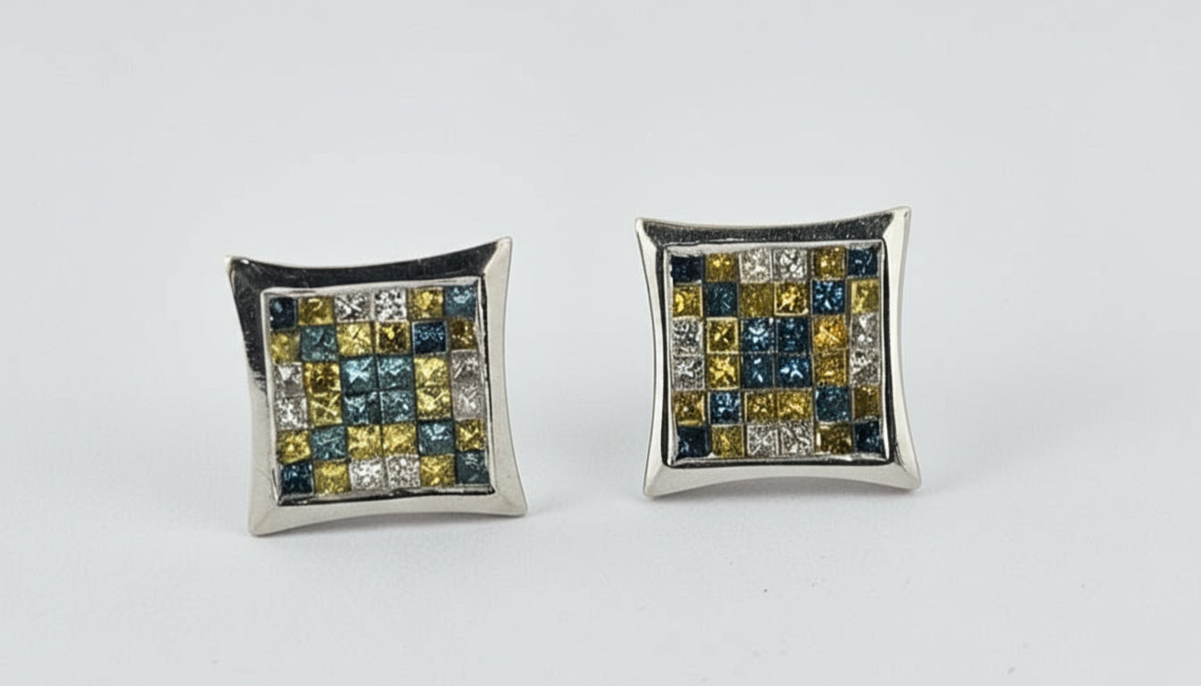 Pair of square-shaped earrings with gemstones on a light gray background