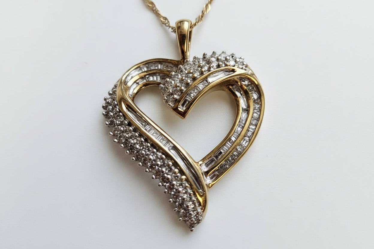 10KYELLOW GOLD DIAMOND HEART .54 CTW 2.4 DWT PENDANT