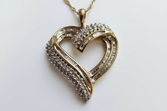 10KYELLOW GOLD DIAMOND HEART .54 CTW 2.4 DWT PENDANT