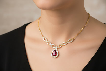 14K YELLOW GOLD DIAMOND .25 CTW, PEAR SHAPE RUBY 0.45 CTW PENDANT